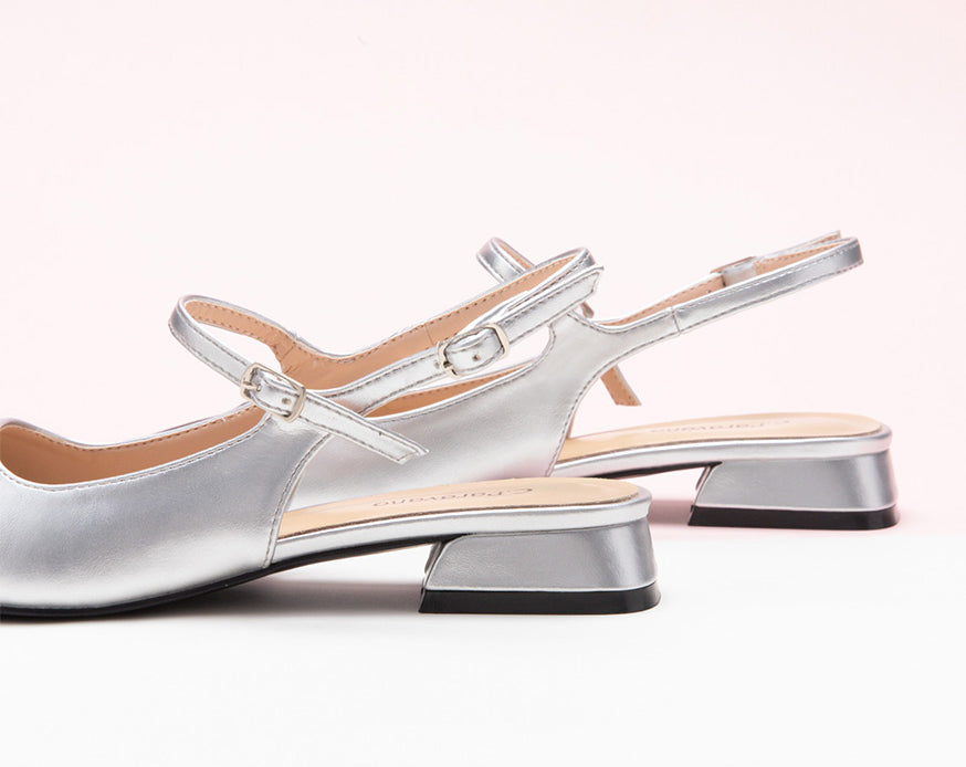 Sleek Silver Slingback Flats: Step out in style with these elegant silver slingback shoes adorned with a modern color block motif