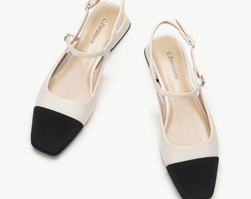 White Color Block Slingback Flats: A stylish pair of white slingback flats with a contemporary color block design