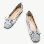 Silky-blue-ballet-flats-with-a-feminine-bowknot-detail_-perfect-for-a-graceful-look.