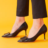 Sleek-and-versatile-black-buckled-pumps_-exuding-a-sense-of-elegance-and-refinement