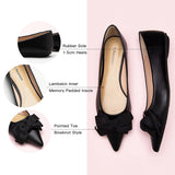 Sleek-black-flats-with-a-glossy-leather-finish-and-pointy-toe-side-view