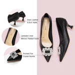 Sophisticated-black-pumps-adorned-with-embellishments_-exuding-a-sense-of-elegance-and-luxury