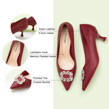 Sophisticated-red-leather-pumps-with-beautiful-embellishments_-offering-a-stylish-and-refined-choice-for-your-footwear-collection