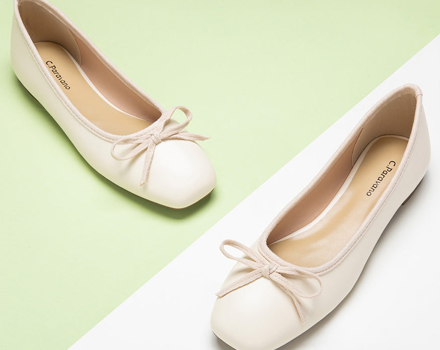 Sophisticated-white-ballerina-flats-adorned-with-a-delicate-and-graceful-bowknot-2