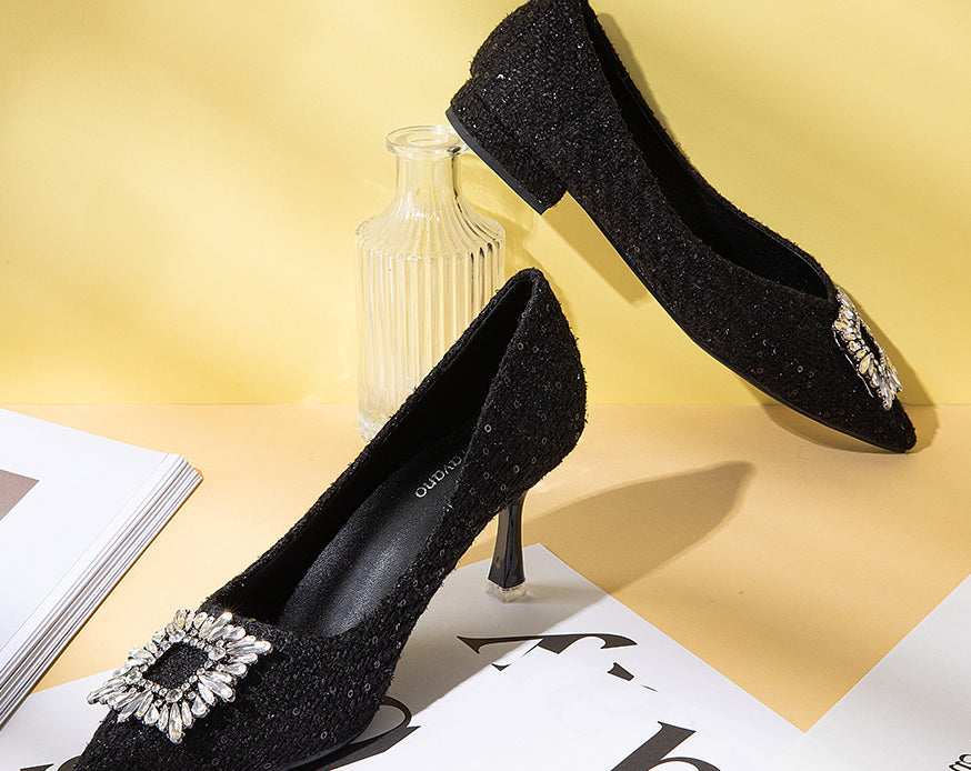 Striking-black-tweed-pumps-with-exquisite-embellishments_-exuding-a-sense-of-sophistication-and-style