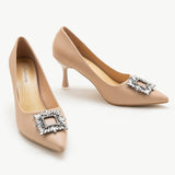 Stylish-beige-leather-pumps-with-intricate-embellishments_-offering-a-versatile-and-sophisticated-choice-for-your-footwear-collection