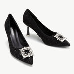 Stylish-black-tweed-pumps-with-intricate-embellishments_-offering-a-sophisticated-and-fashionable-choice-for-your-footwear-collection