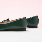 Stylish-dark-green-ballet-flats-with-a-delightful-bowknot-detail-and-a-soft-suede-toe.