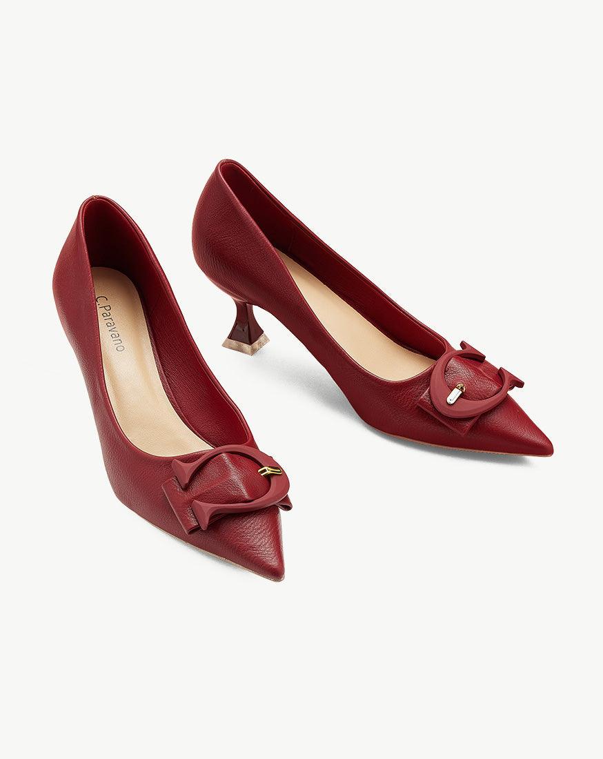 Stylish-red-C-buckled-pumps_-offering-a-fashionable-and-eye-catching-choice-for-your-footwear-collection