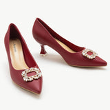 Stylish-red-leather-pumps-with-exquisite-embellishments_-offering-a-bold-and-glamorous-choice-for-your-footwear-collection