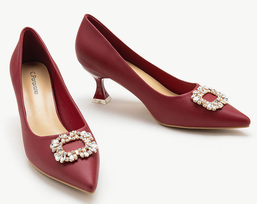 Stylish-red-leather-pumps-with-exquisite-embellishments_-offering-a-bold-and-glamorous-choice-for-your-footwear-collection