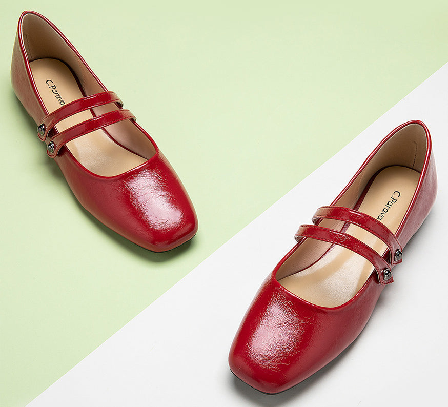 Stylish-red-mary-jane-with-double-straps-combining-fashion-and-comfort-effortlessly.