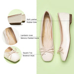 Stylish-white-ballet-flats-enhanced-with-a-beautiful-bowknot-embellishment-for-a-fashionable-appeal.