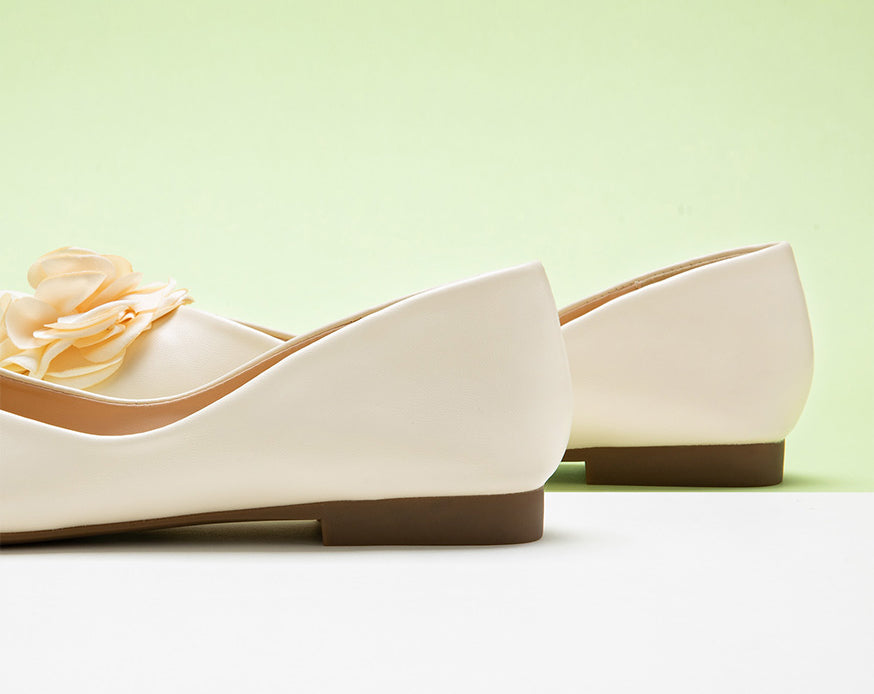 Stylish-white-flat-ballerina-shoes-designed-for-a-minimalist-aesthetic