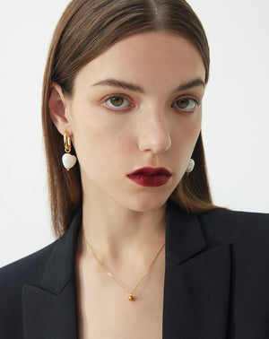     Stylish-white-heart-earrings_-adding-a-touch-of-charm-and-simplicity-to-your-loo1