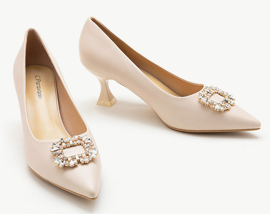 Stylish-white-leather-pumps-with-intricate-embellishments_-offering-a-sophisticated-and-fashionable-choice-for-your-footwear-collection