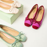 Trendy-silky-light-green-ballet-flats-adorned-with-a-playful-bowknot_-perfect-for-a-fashionable-appeal.
