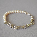 Molten Baroque Pearl Twisted Chain Bracelet, coiled with a touch of platinum luxury, this bracelet adds a hint of glamour and sophistication to your wrist, making it perfect for special occasions