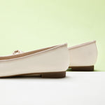 Versatile-white-ballet-flats-with-a-chic-bowknot-design_-perfect-for-various-occasions