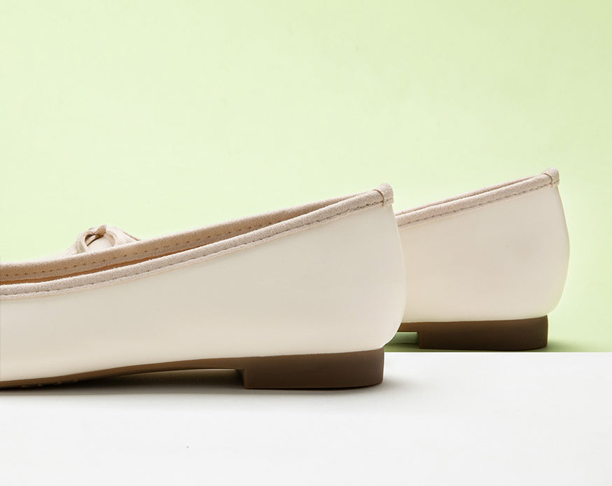 Versatile-white-ballet-flats-with-a-chic-bowknot-design_-perfect-for-various-occasions