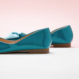 Stunning peacock blue square flats with a delightful bowknot embellishment – make a confident and stylish statement with these vibrant shoes.
