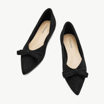 Classic black suede ballet flats for timeless style.