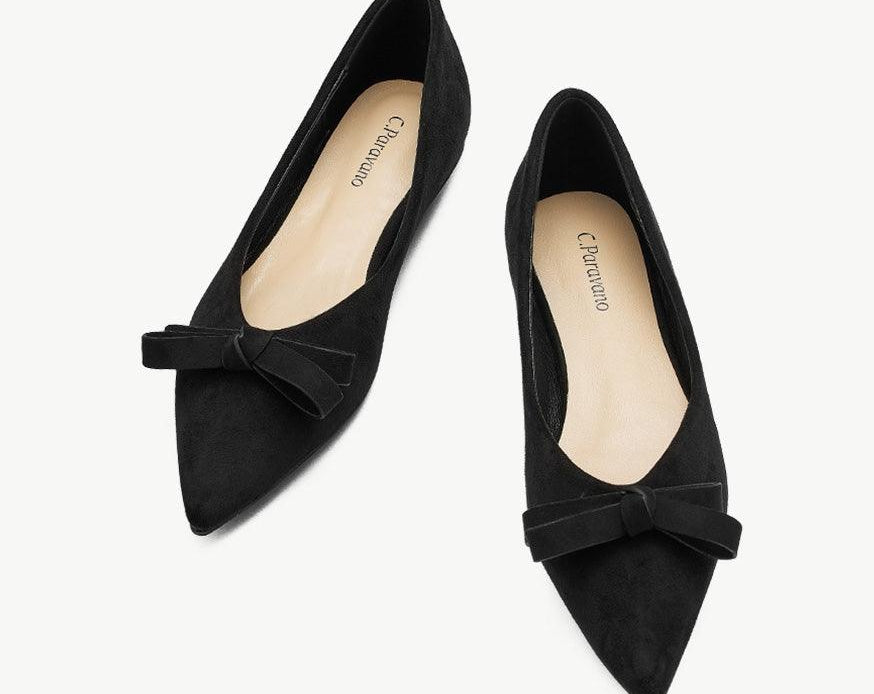 Classic black suede ballet flats for timeless style.