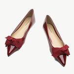 Elegant red Patent Leather Point Toe Flats, perfect for a touch of sophistication.