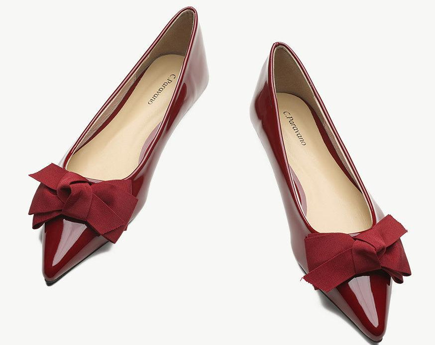 Elegant red Patent Leather Point Toe Flats, perfect for a touch of sophistication.