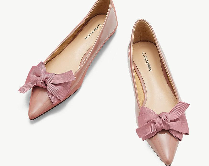 Elegant pink Point Toe Flats in glossy patent leather, a graceful and fashionable choice