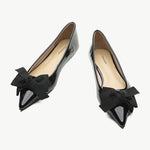 Sleek black Patent Leather Point Toe Flats, a versatile and elegant choice