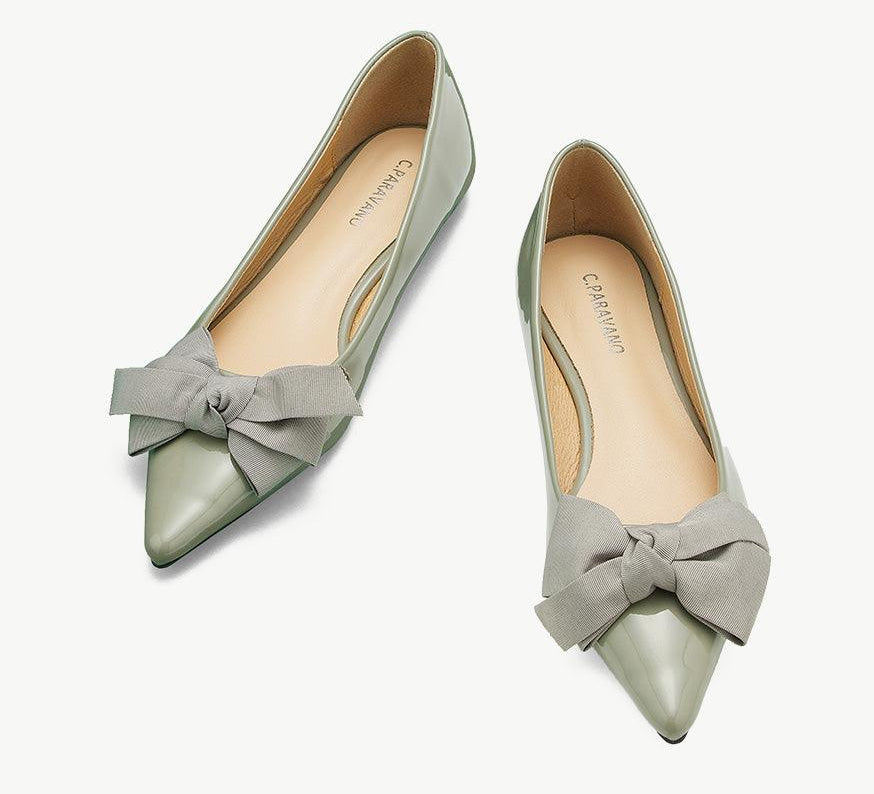 Stylish green Patent Leather Point Toe Flats, adding a pop of color to your ensemble.