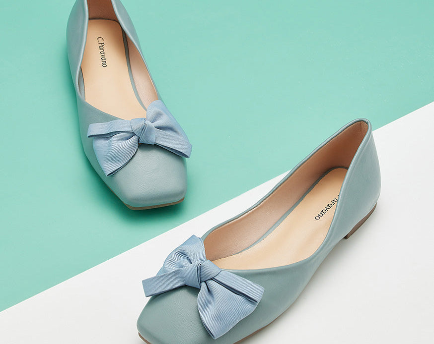 Blue square flats with a charming bowknot accent for a chic look