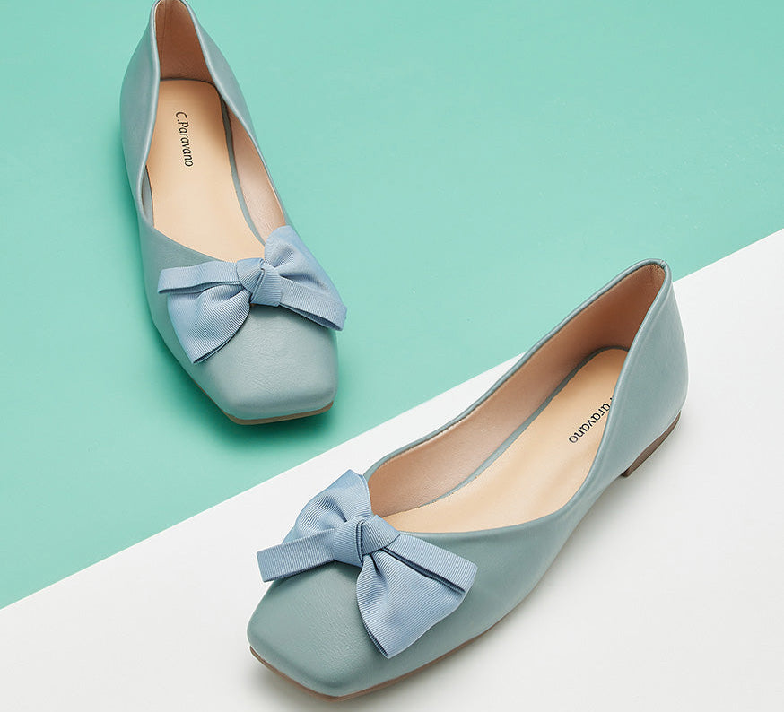 Blue square flats with a charming bowknot accent for a chic look