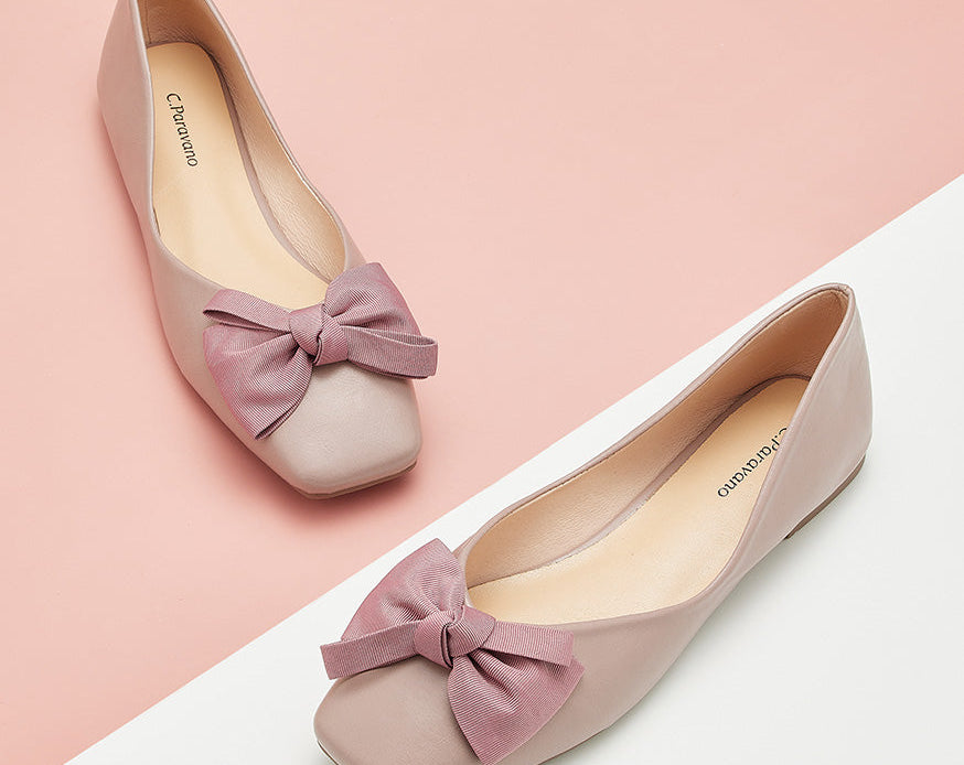 Picture of delicate light pink square flats with a bowknot detail for elegance