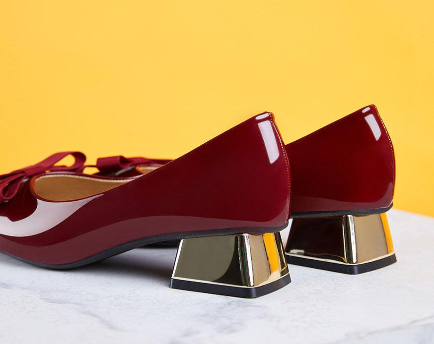 Sleek Red Patent Leather Pumps with a Medium Heel