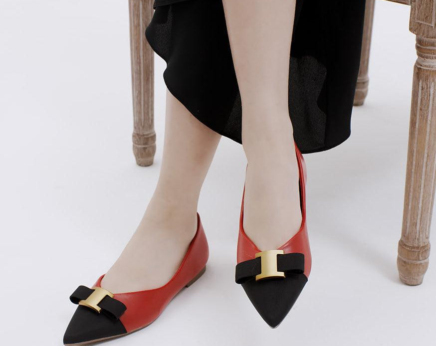 Make a statement with red embellished leather flats.