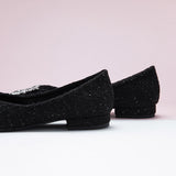 Embellished black tweed ballet flats for a classic look