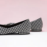 Embellished tweed flats in a classic houndstooth pattern