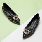 Classic tweed flats with sophisticated embellishments