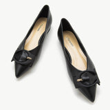 Chic and elegant black point-toe flats in genuine leather
