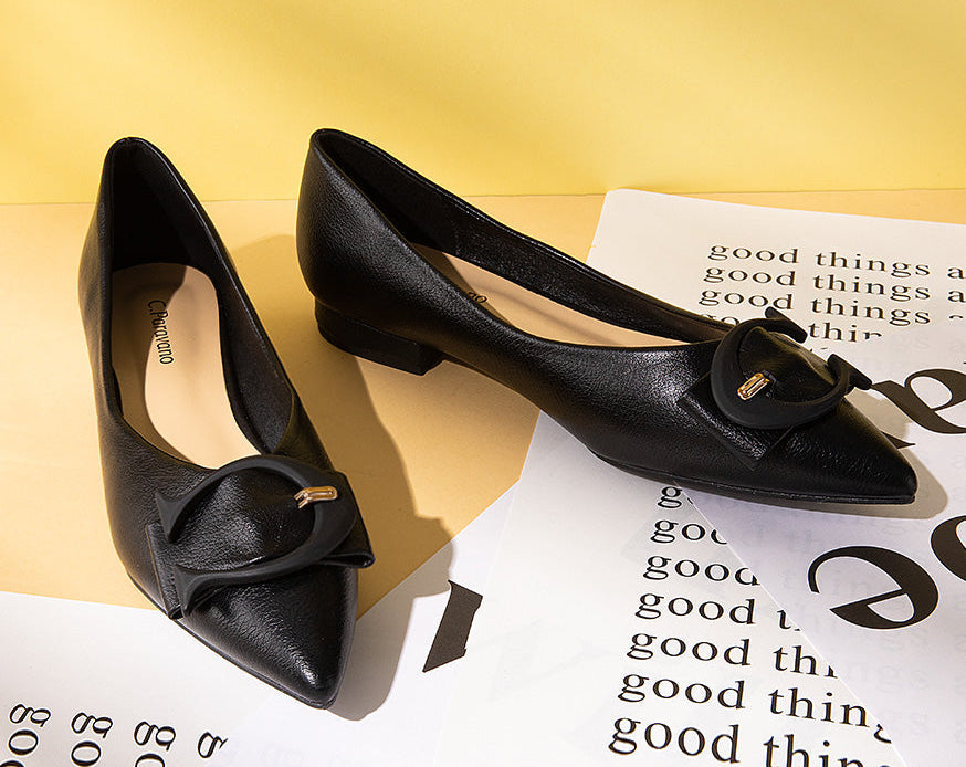 Grain leather black flats with a stylish pointed toe
