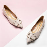 Classic white flats made from high-quality grain leather