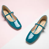  Patent Crossed Stripe Mary Jane shoes in a serene blue hue, a stylish and vibrant choice for a touch of the sea