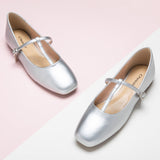 Patent Crossed Stripe Mary Jane shoes in a sleek silver shade, a timeless and versatile choice for a touch of sophistication